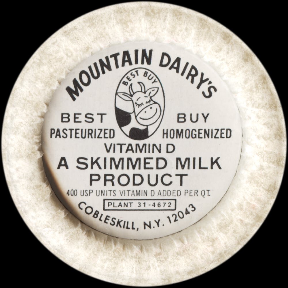 Mountain Dairy Best Buy skimmed milk product cap from Cobleskill, New York.