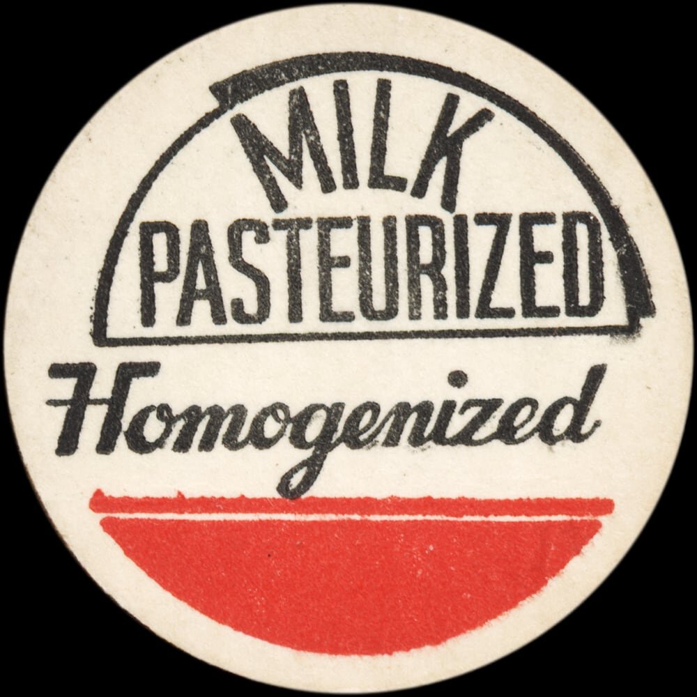 Vintage circular dairy cap with printed typographic milk advertising and a metal pull tab.