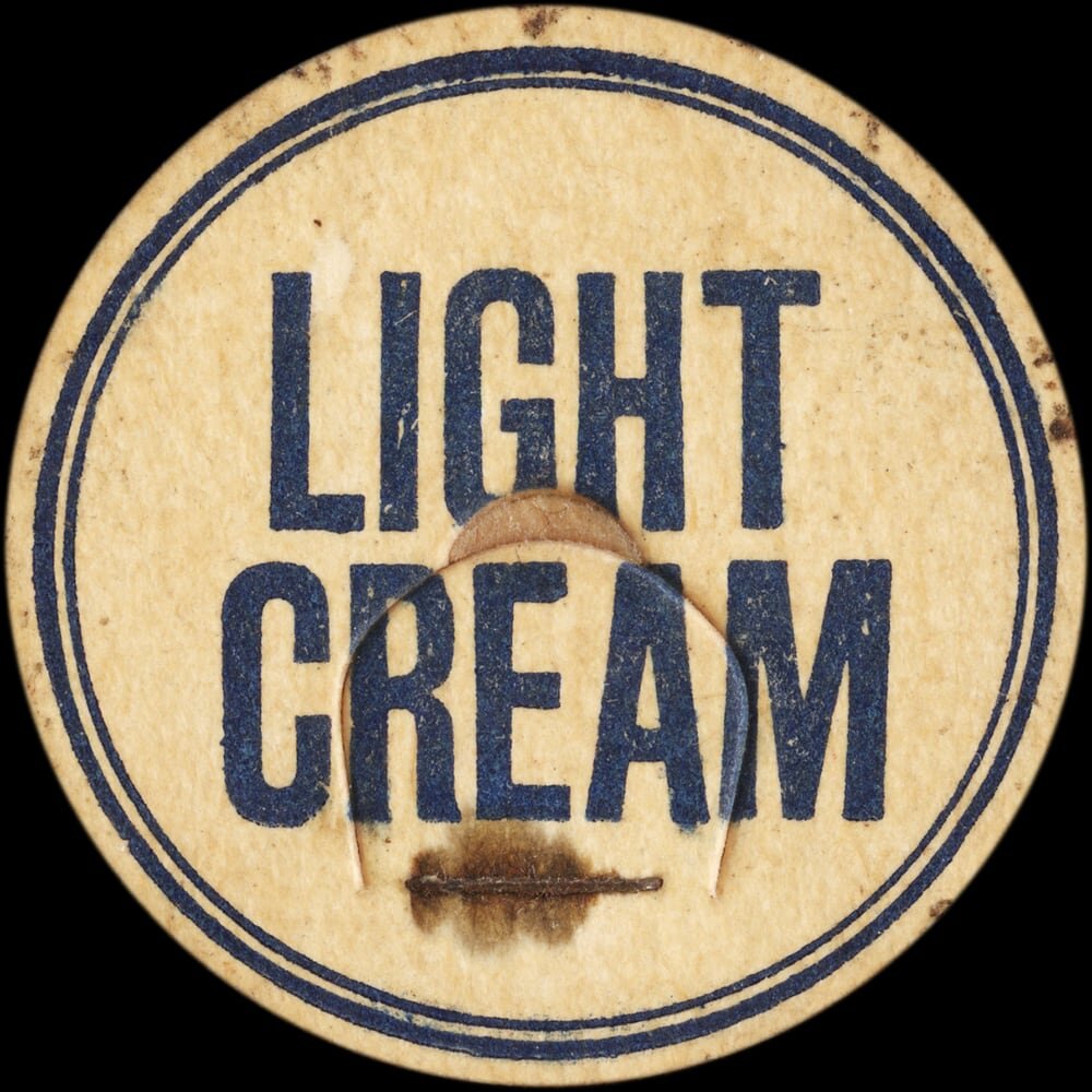 Meredith Inn Dairy orange drink cap from Delhi, New York.