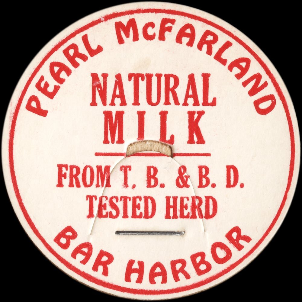 Vintage circular dairy cap with printed typographic milk advertising and a metal pull tab.