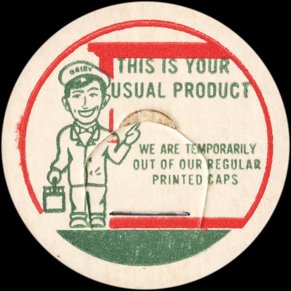 Vintage circular dairy cap with printed typographic milk advertising and a metal pull tab.