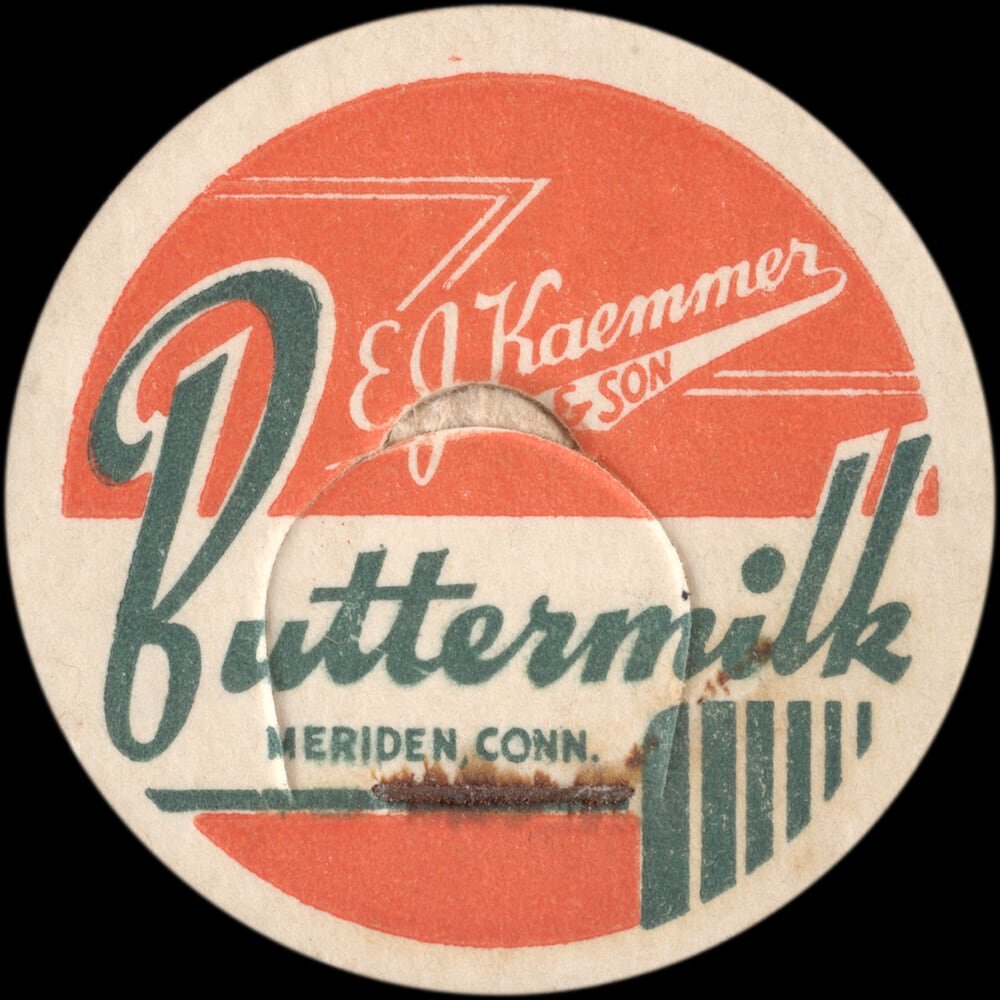 E. Kraemer and Son buttermilk cap from Meriden, Connecticut.