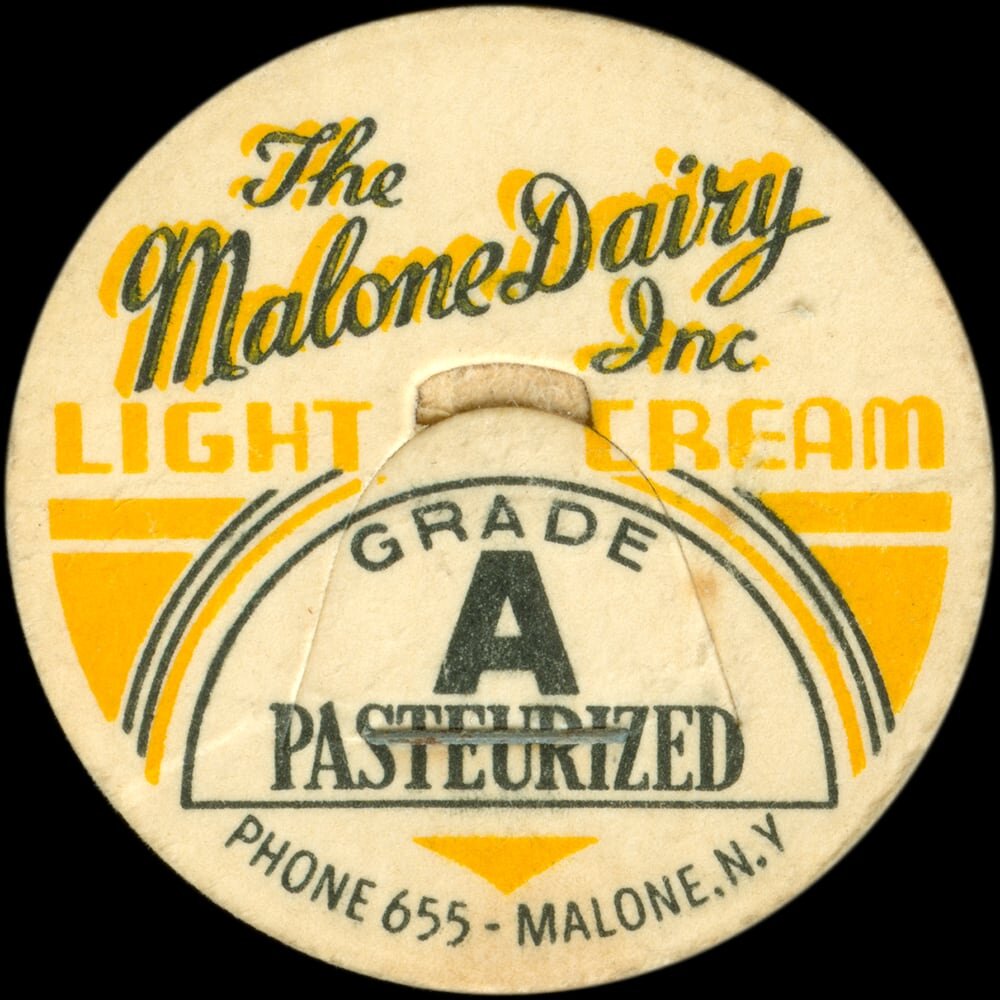 Malone Dairy Grade A pasteurized light cream cap from Malone, New York.