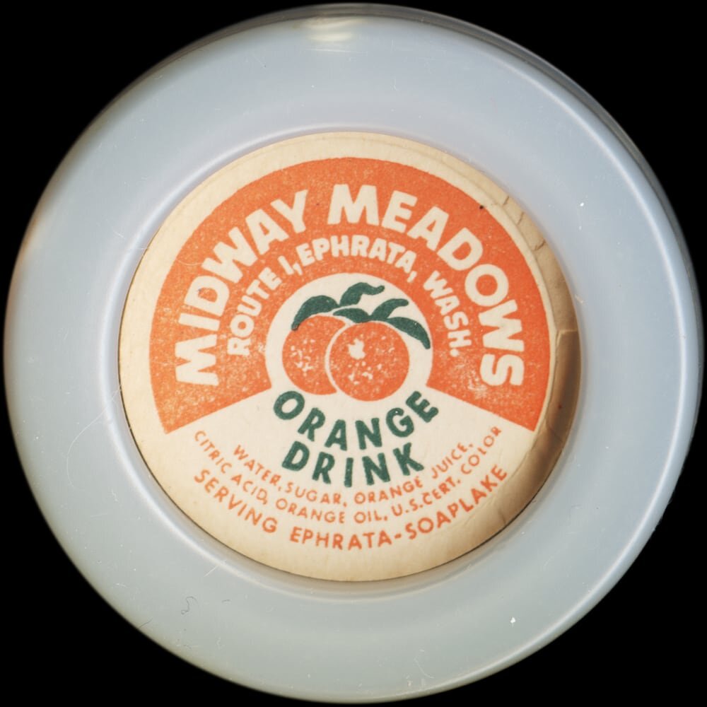 Midway Meadows orange drink cap from Ephrata, Washington.