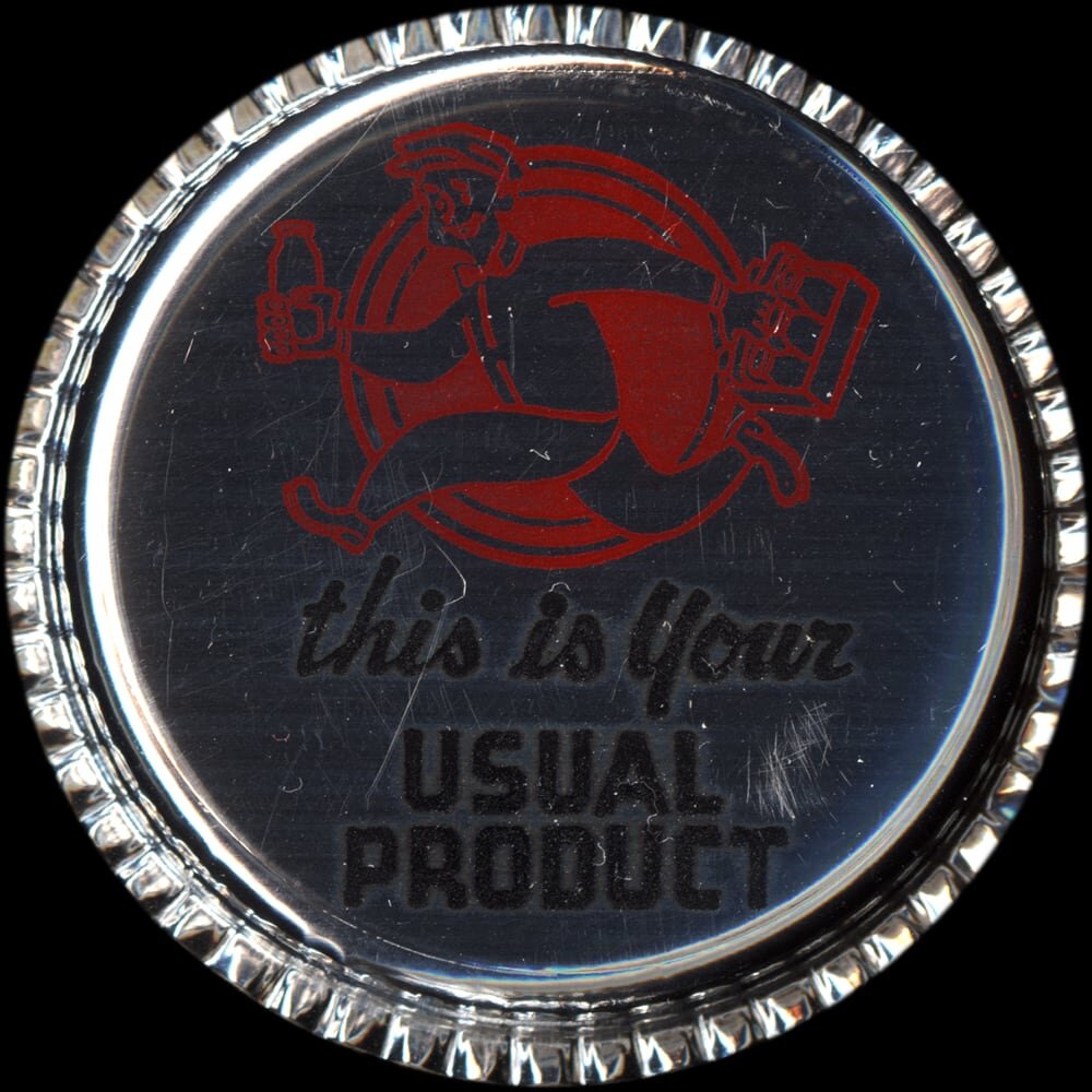 Vintage circular dairy cap with printed typographic milk advertising and a metal pull tab.