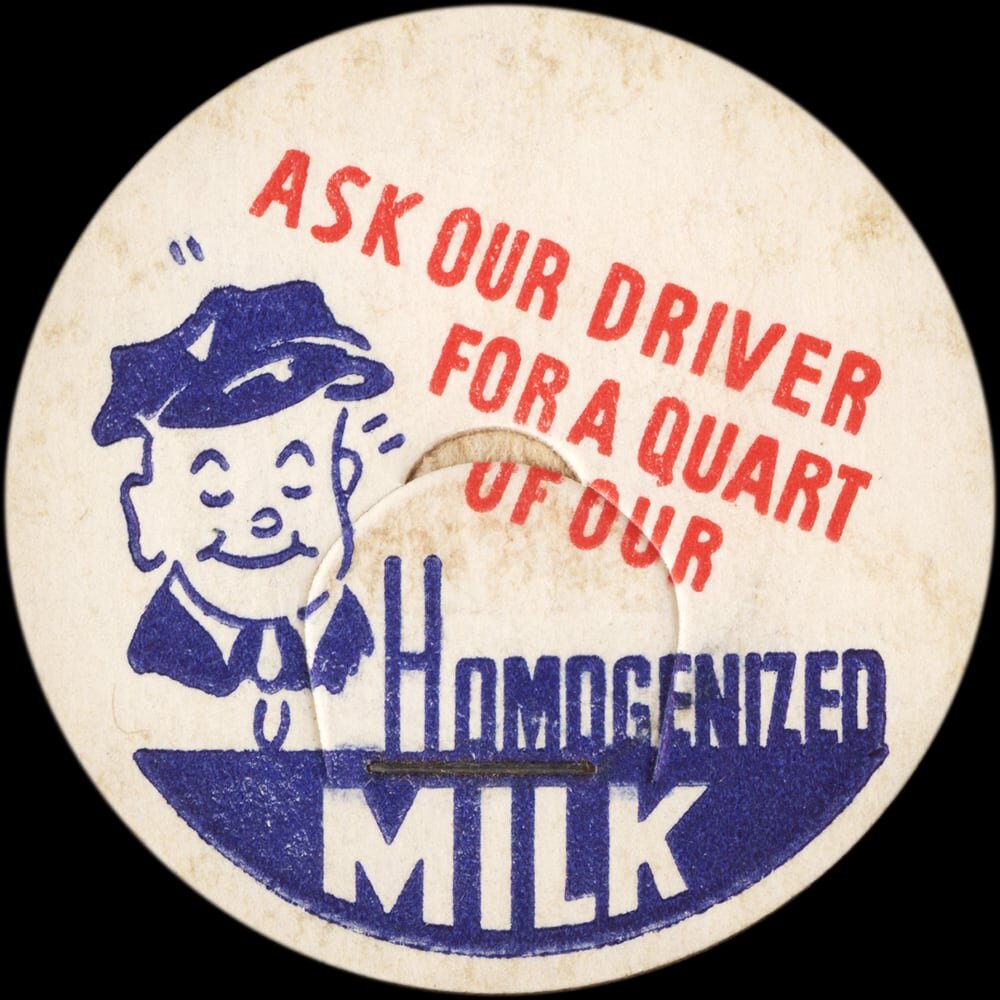 Vintage circular dairy cap with printed typographic milk advertising and a metal pull tab.